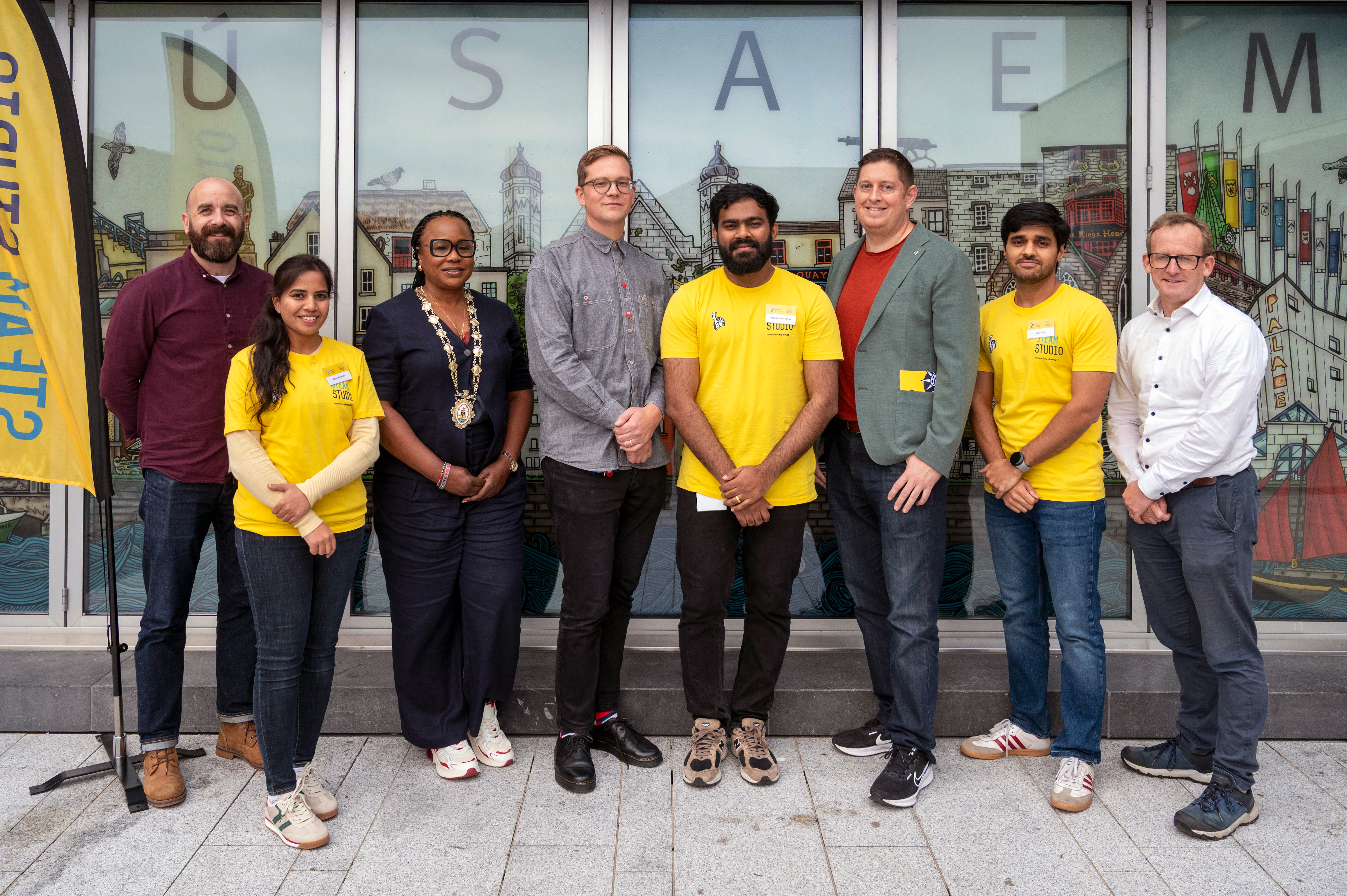 Liberty IT STEAM Studio Ambassadors pictured with representatives from the community 