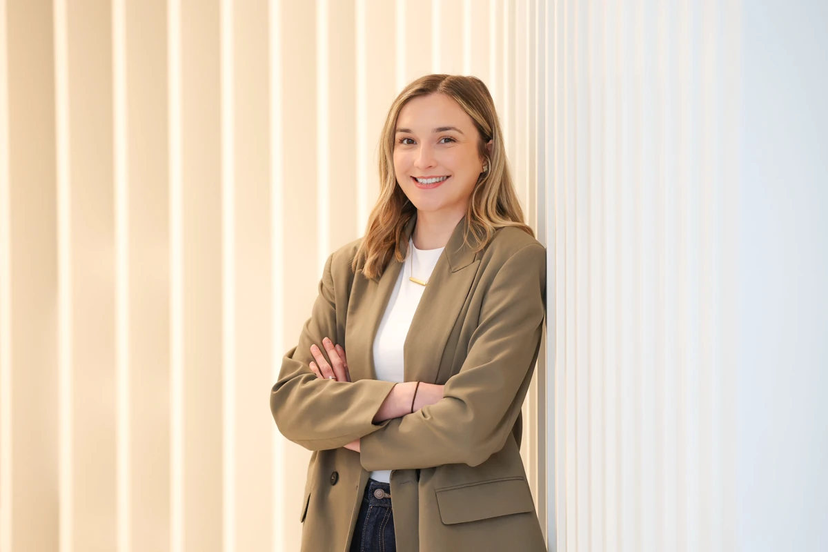 Amanda smiling in an office environment