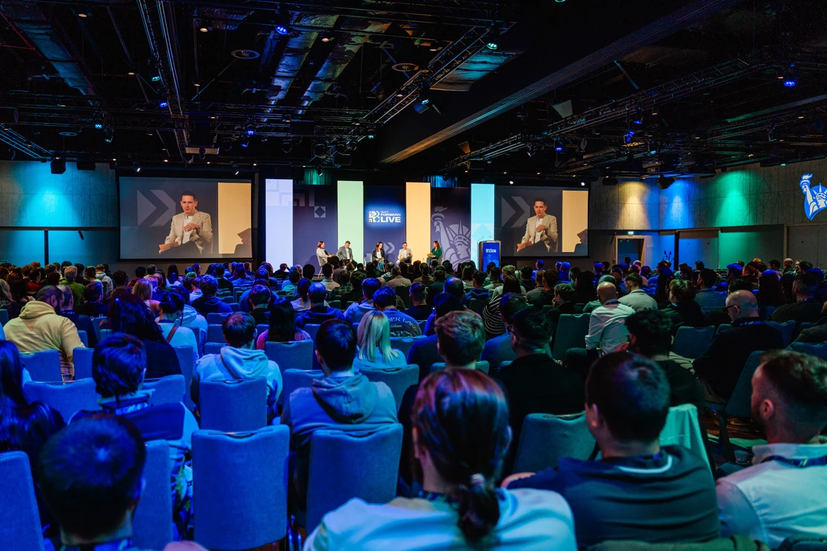Audience at Forward Live event during a panel discussion